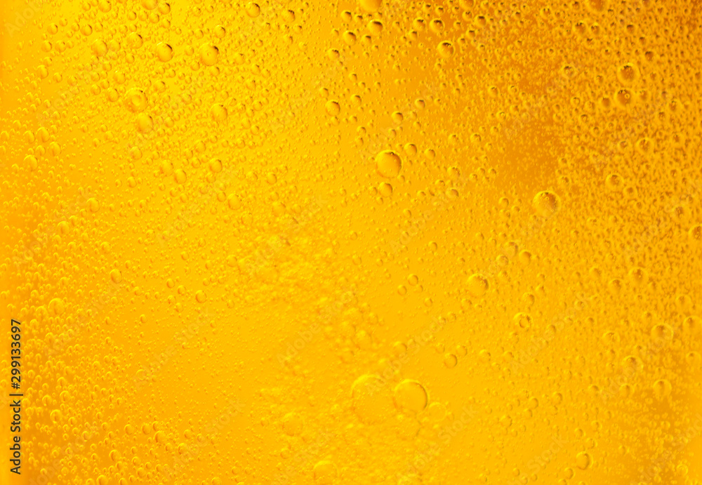 Bubbles on beer background. Oil drop shape on yellow background.Golden circle bubble water pattern. Bubbles on beer background. Oil drop shape on yellow background.Golden circle bubble water pattern.