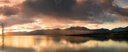 loch linnhe in the argyll region of the highlands of scotland during an autumn sunset showing golden light on the clouds and water and the islands of lismore and shuna © Andy Morehouse
