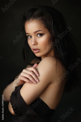Studio portrait of young beautiful woman