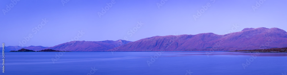 aerial shot of loch linnhe in the argyll region of the highlands of scotland during autumn near sunset