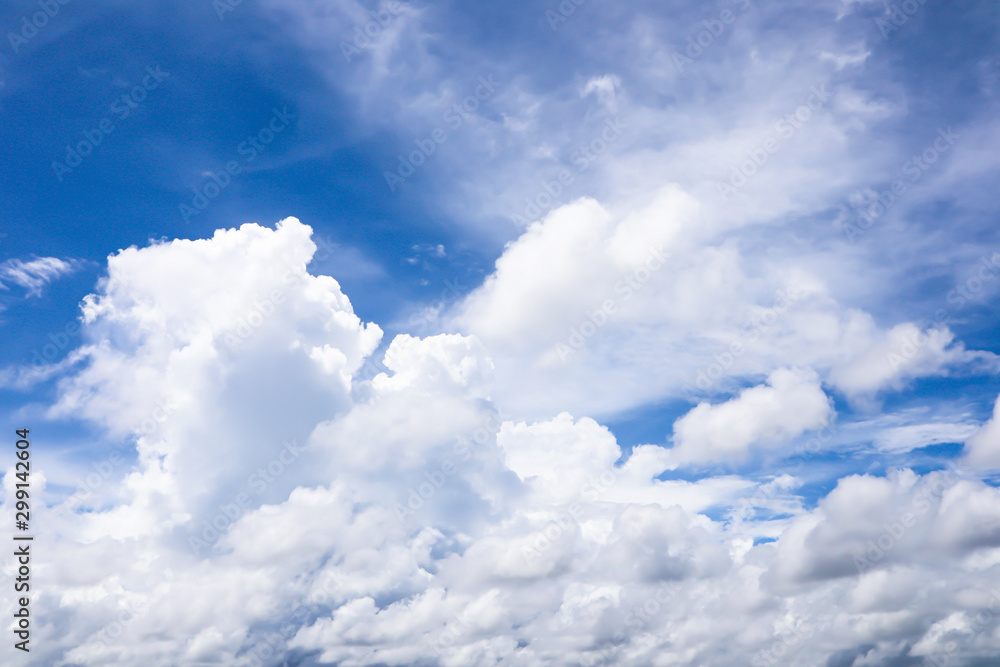 Naklejka premium Blue sky background with clouds.