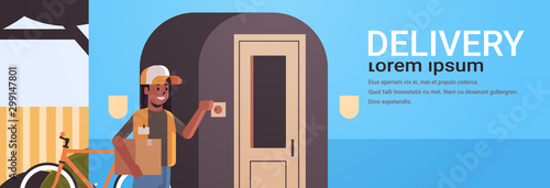 african american courier woman delivering cardboard parcel ringing house doorbell express delivery service concept horizontal full length flat copy space vector illustration