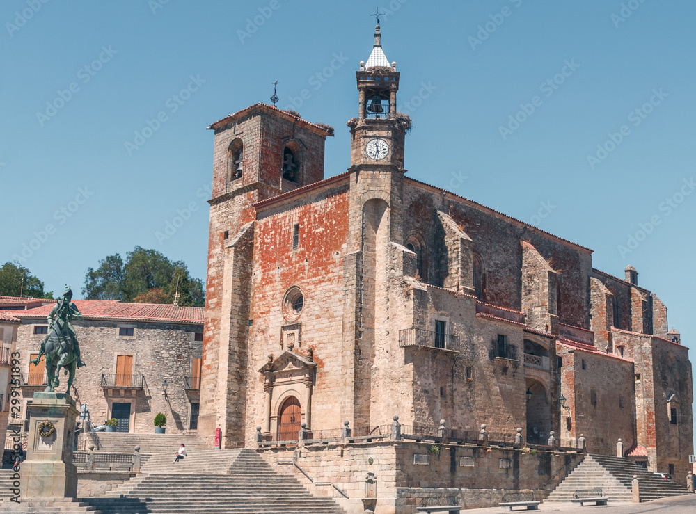 TRUJILLO, EXTREMADURA, SPAIN - AUGUST 08, 2019: Saint Martin´s Church. Tourists in the architectural and monumental complex of the ancient and picturesque streets of Trujillo