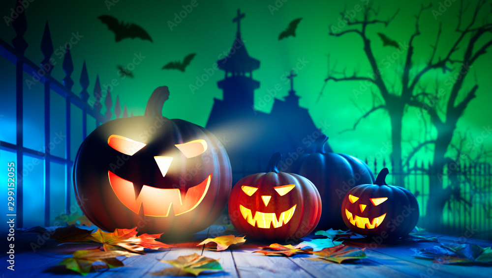 Familiy of spooky Pumkins at Halloween Night