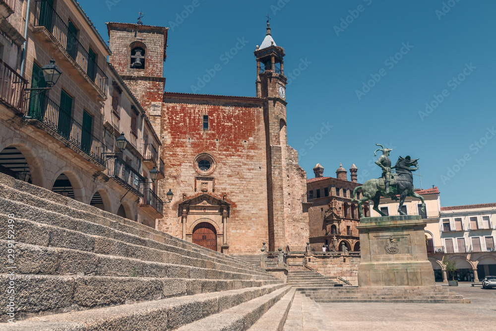 TRUJILLO, EXTREMADURA, SPAIN - AUGUST 08, 2019: Main square. Tourists in the architectural and monumental complex of the ancient and picturesque streets of Trujillo