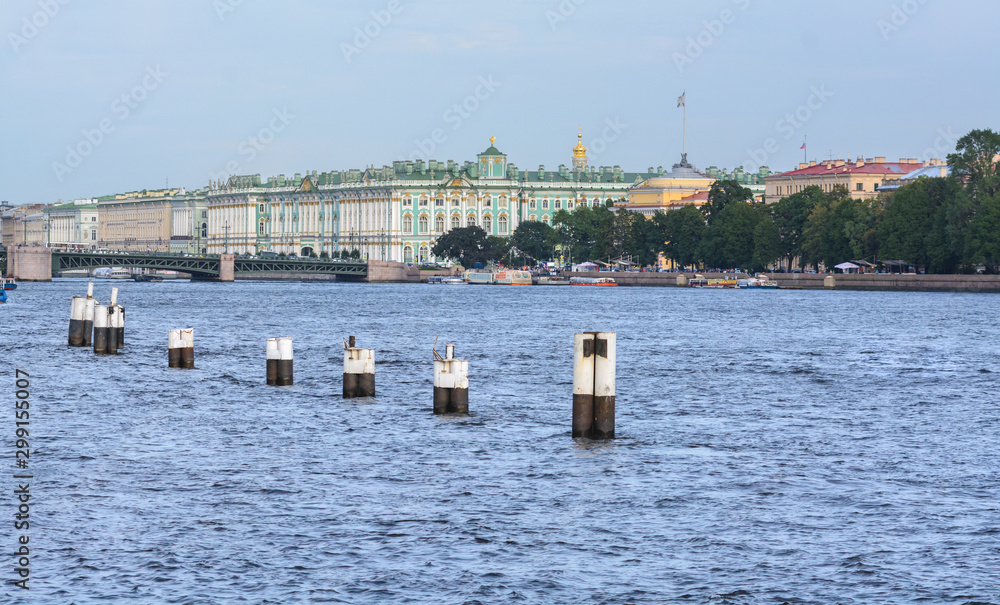 Naklejka premium Panorama of the Palace Embankment from the University Embankment in the city of St. Petersburg. The historic city center.