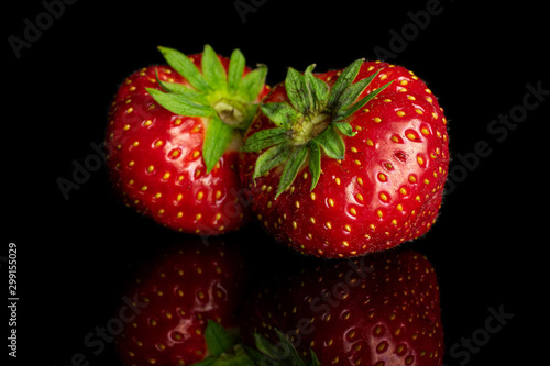 Wallpaper Mural Group of two whole fresh red strawberry isolated on black glass Torontodigital.ca