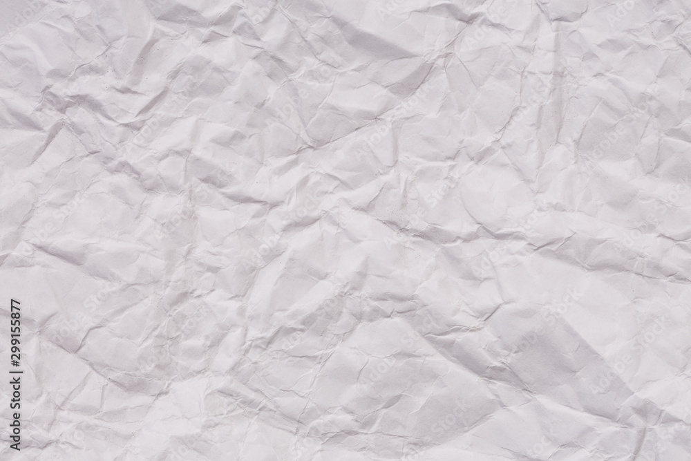 Fototapeta premium Paper crumple with the texture of the surface,White creased paper texture for abstract background..