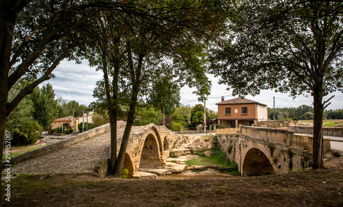 Puente Romano del Priorato - Roman bridge over Tiron River near Cihuri town, La Rioja, Spain - and a contemporary bridge next to it