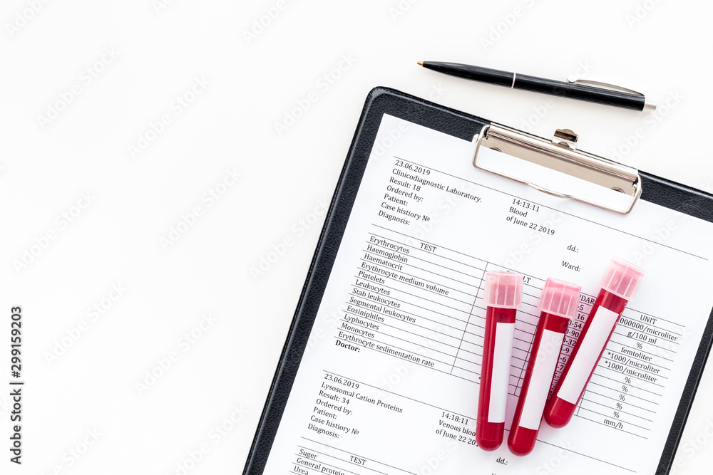 Blood test results on white background top view copy space Blood test results on white background top view copy space