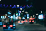 Unfocused image of the city night traffic, rear lights, wallpaper; blurred photo concept.