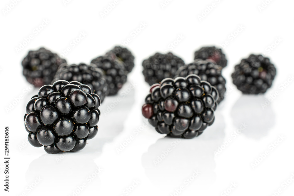 Lot of whole fresh black blackberry isolated on white background Lot of whole fresh black blackberry isolated on white background