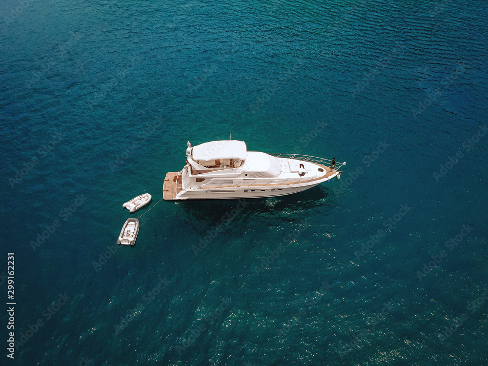 Bird eye view of the amazing white yacht in the Andaman sea; vessels concept. Bird eye view of the amazing white yacht in the Andaman sea; vessels concept.
