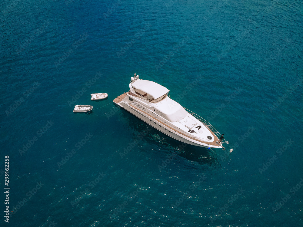 Bird eye view of the amazing white yacht in the Andaman sea; vessels concept.