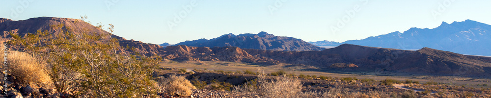 Ultra-wide panorama of Gold Butte National Monument at dawn as seen from Lake Mead National Recreation Area in Nevada Ultra-wide panorama of Gold Butte National Monument at dawn as seen from Lake Mead National Recreation Area in Nevada
