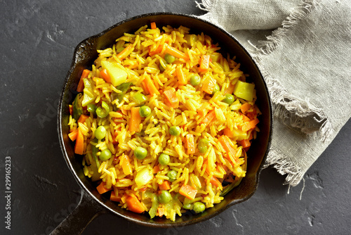 Vegetarian pilaf in frying pan photo