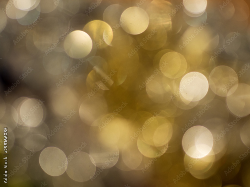 Christmas light background. Holiday glowing backdrop. Defocused Background. Blurred Bokeh.