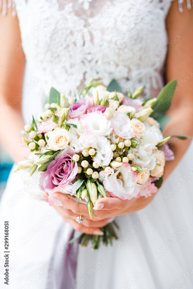 White bridal bouquet of roses and peonies. Wedding day. White bridal bouquet of roses and peonies. Wedding day.
