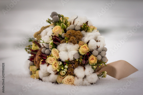 wedding bouquet with cotton and yellow roses on a white background