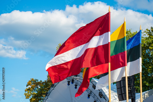 Latvian, Lithuanian and Estonian flags waving together, Latvia, Lithuania, Estonia, Baltic countries, united, independent  photo