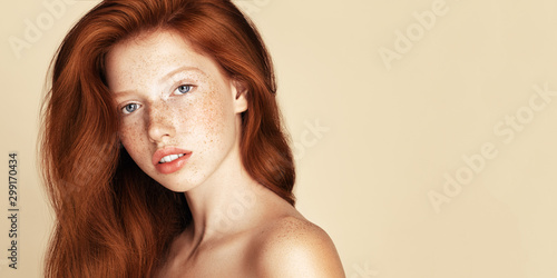 Fotografie, Obraz Freckles young Beauty girl portrait