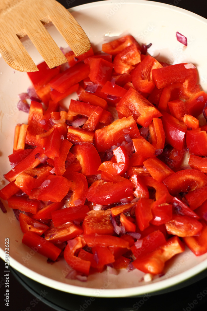 Frying Bell Pepper. Series - making tortilla with chicken and be Frying Bell Pepper. Series - making tortilla with chicken and be