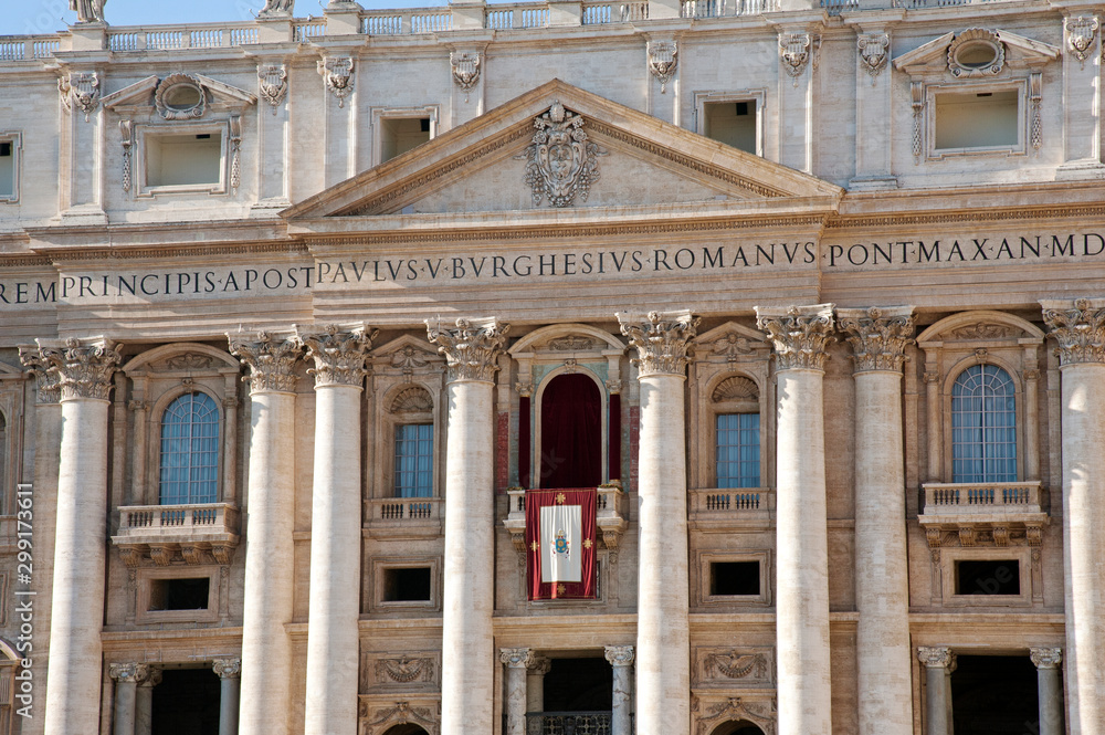 Façade of the Basilica of St. Peter in the Vatican, Rome. The entrance and the loggia where the Pope looks out. 
