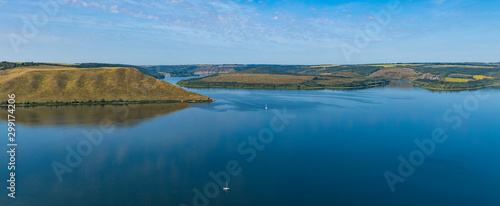 morning peaceful scenic view landscape photography of lake smooth water and hill land country side natural panorama in clear weather time 