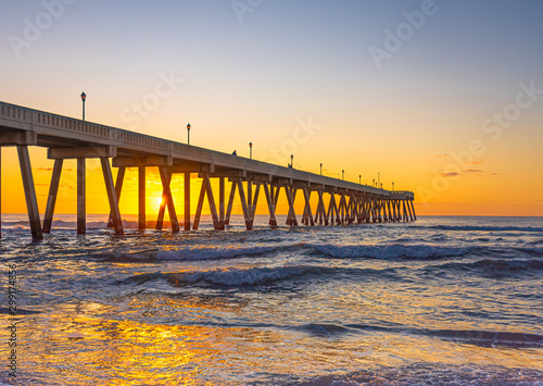 Johnnie Mercers Fishing Pier at sunrise in Wrightsville Beach east of Wilmington North Carolina United State.