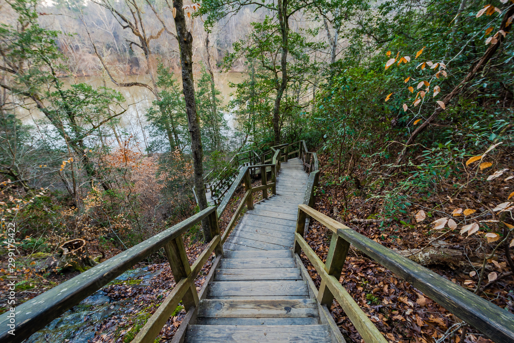 Trail path with wooden handrail in Raven Rock State Park, North Carolina, United States. Trail path with wooden handrail in Raven Rock State Park, North Carolina, United States.