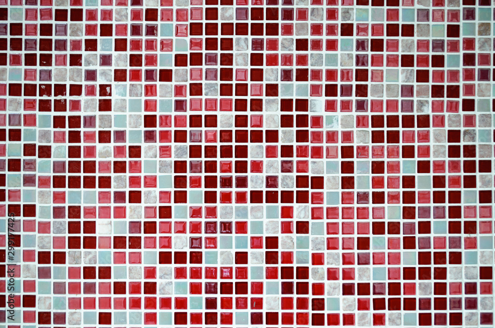 Fototapeta premium Ceramic mosaic tiles in red tones.