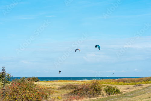 Kiteboarder in the Baltic Sea at the beach of Flügge on the island of Fehmarn in the north of Germany