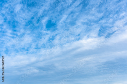 Blue sky with cloud background.