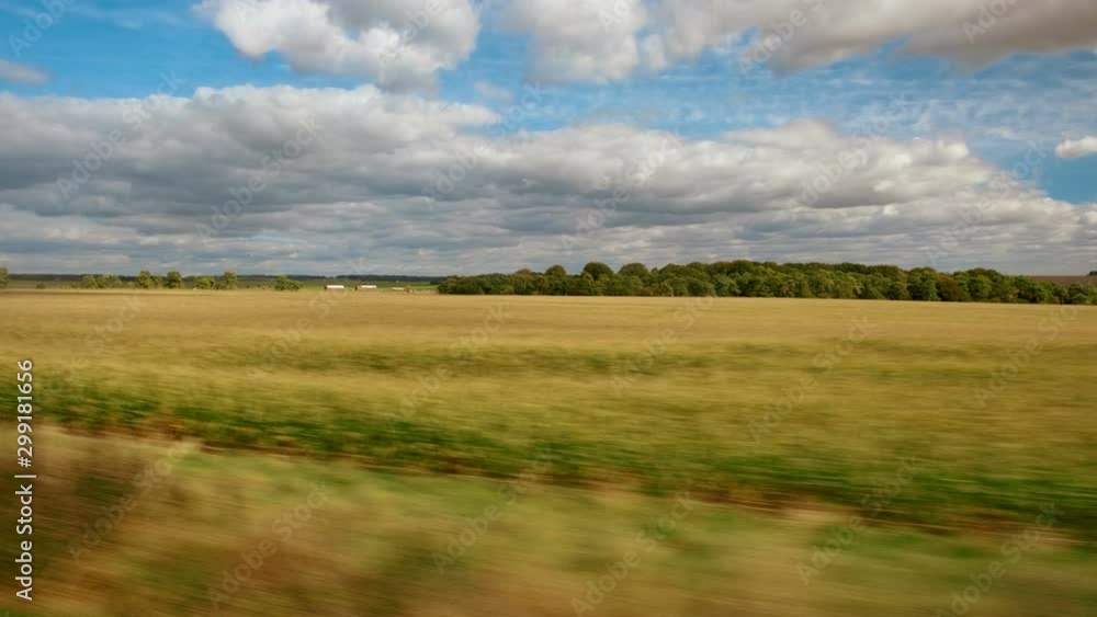 Passengers view of the amazing Wilshire countryside in England UK close to Salisbury and Stonehenge Passengers view of the amazing Wilshire countryside in England UK close to Salisbury and Stonehenge