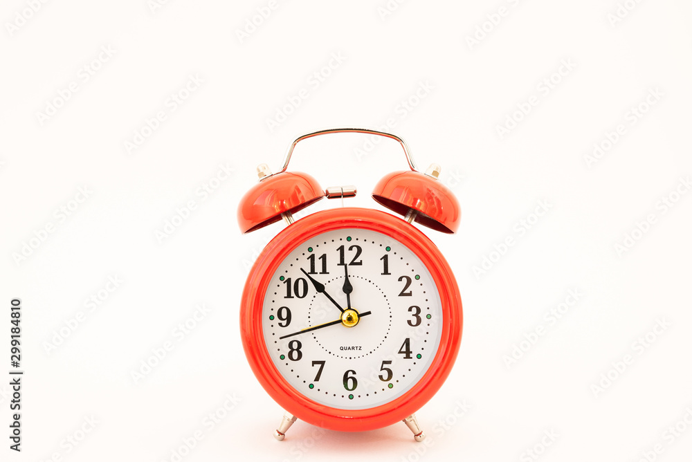 red alarm clock on white background red alarm clock on white background