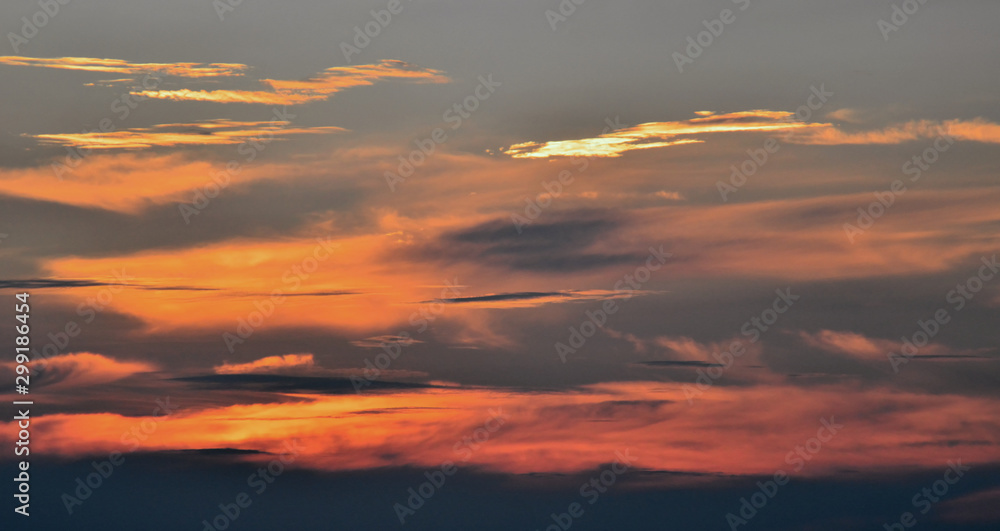 Dramatic sky, Clouds with sunset light effect on