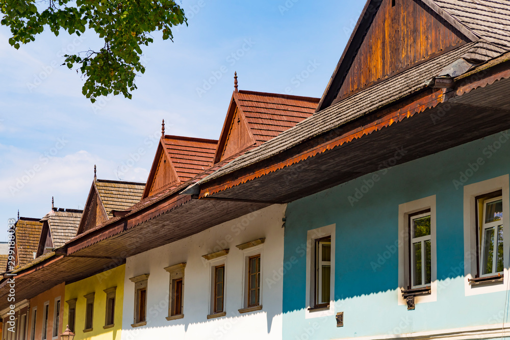 Ancient wooden roofs of colorful medieval houses.