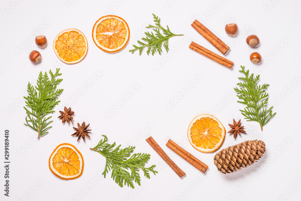 Christmas flat lay background with fir tree and spices on white. Christmas flat lay background with fir tree and spices on white.