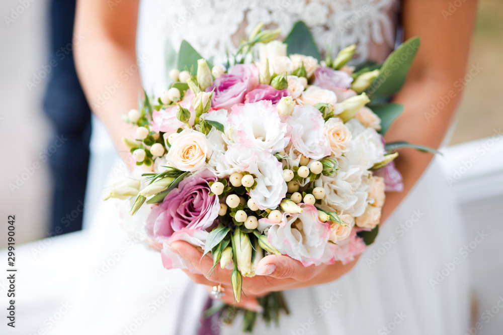 White bridal bouquet of roses and peonies. Wedding day. White bridal bouquet of roses and peonies. Wedding day.