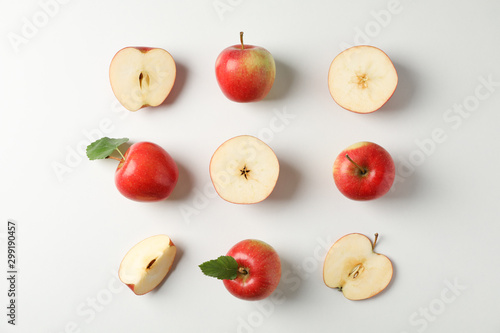 Fototapeta Flat lay with red apples on white background, space for text