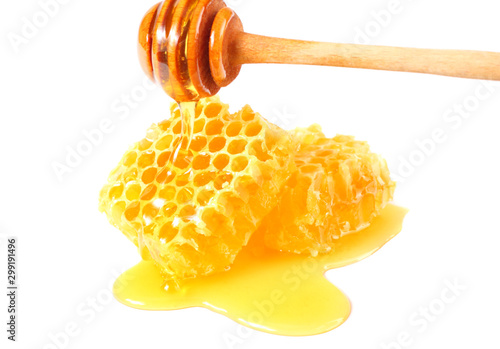 Wallpaper Mural Honeycomb with honey dipper and honey isolated on white background Torontodigital.ca