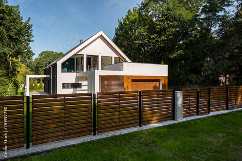 Bild auf Leinwand Spacious house with garage