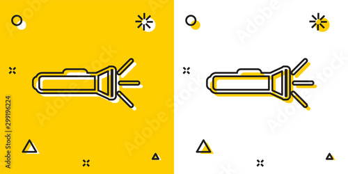 Black Flashlight icon isolated on yellow and white background. Random dynamic shapes. Vector Illustration