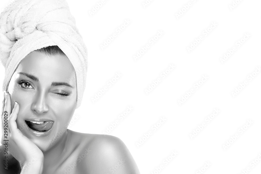 Beautiful Girl in Towel Winking with Funny Expression. Spa Woman Beautiful Girl in Towel Winking with Funny Expression. Spa Woman