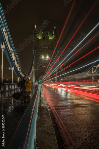 Traffic on Tower Bridge at night.