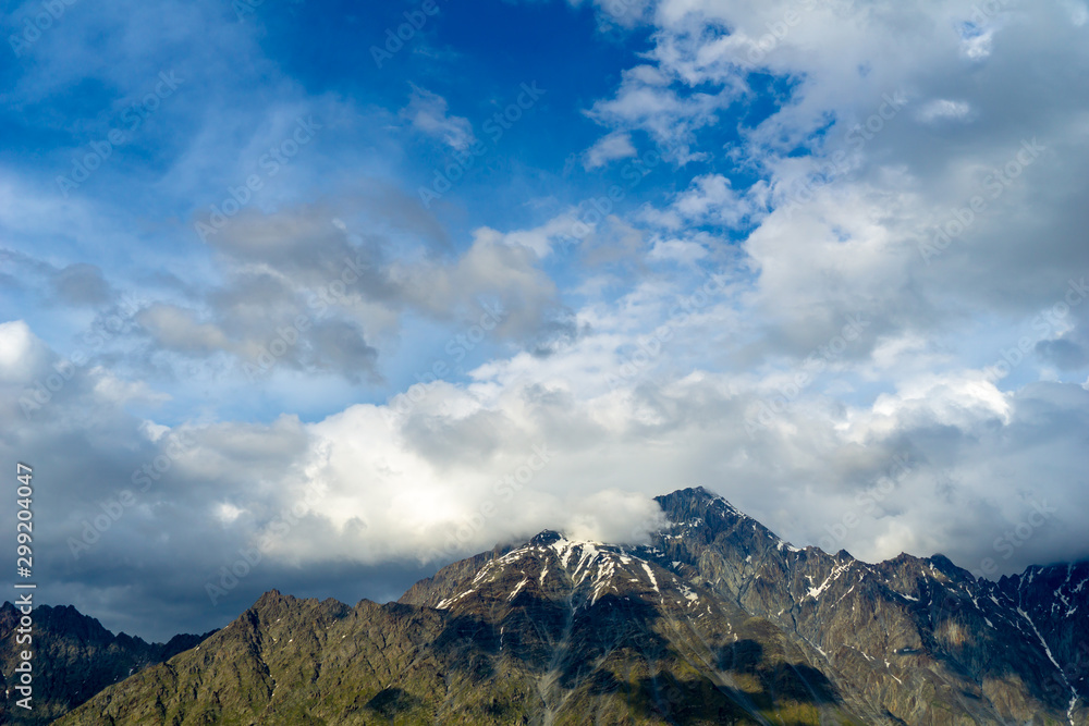 Fototapeta premium Snow mountain in Kazbegi, Georgia. Panoramic image