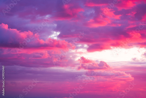 Dramatic pink red sunset  cloudwabe formed by high pression  with beautiful tone color red pink violet  over the sea  magnificent  nature  sunset concept  add your text