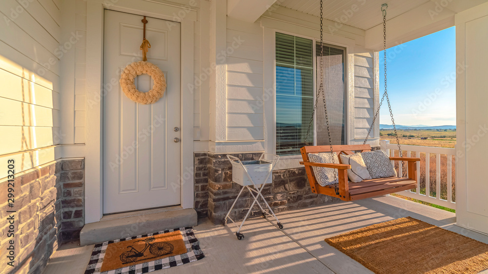 Panorama frame Front porch of modern home with swinging chair - obrazy, fototapety, plakaty 