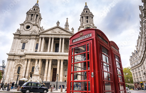 Red Telephone booth near St Pauls Cathedral in London © offcaania