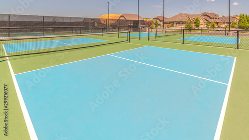 Panorama frame Turf tennis courts with no people on sunny day © Jason